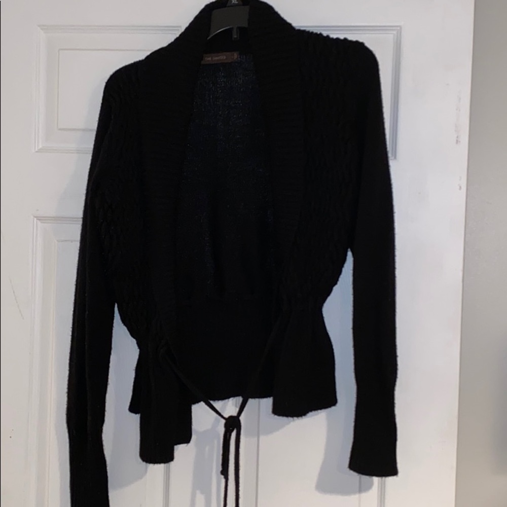 The limited sweater black size Large